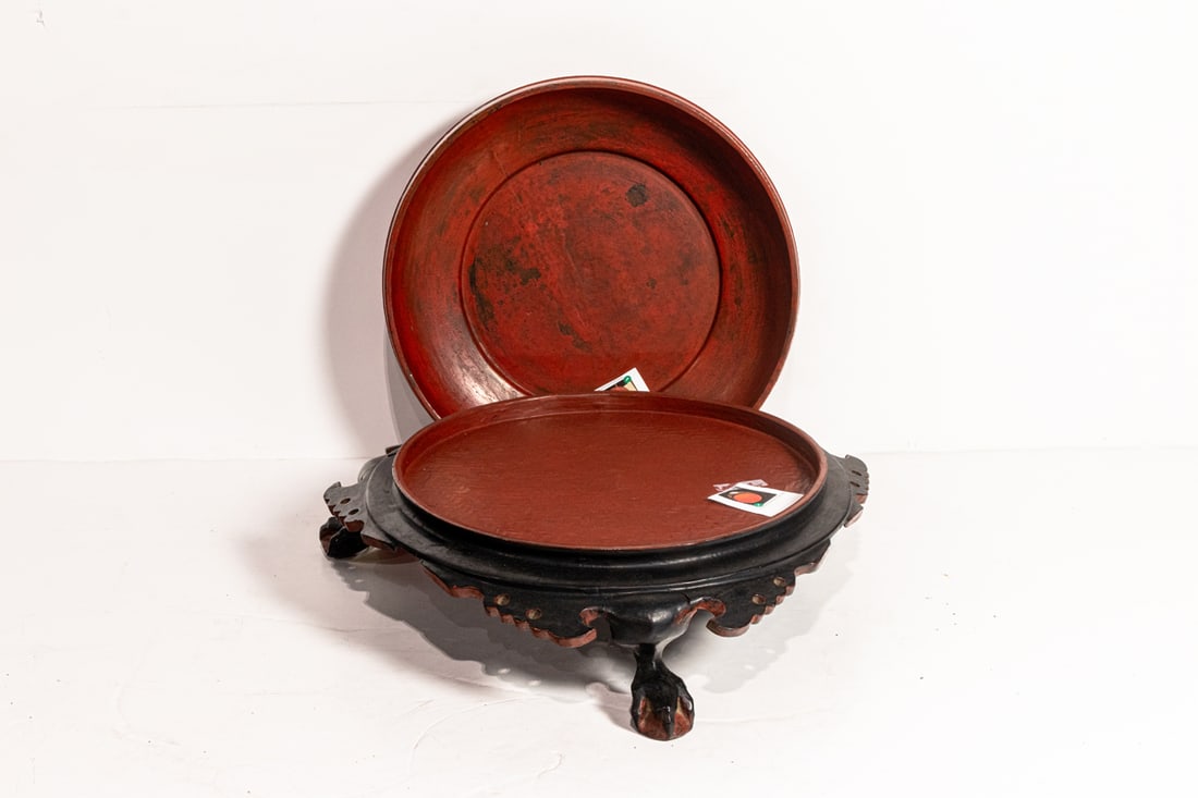 (lot of 2) Burmese lacquered trays: (lot of 2) Burmese lacquered trays. Early 20th century, 21" and 24" wide.