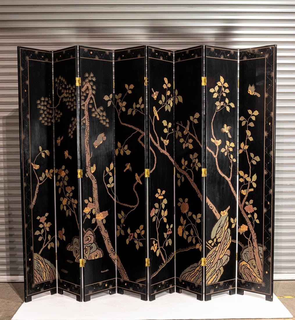 A Chinese eight-panel coromandel style folding screen (1 of 2)