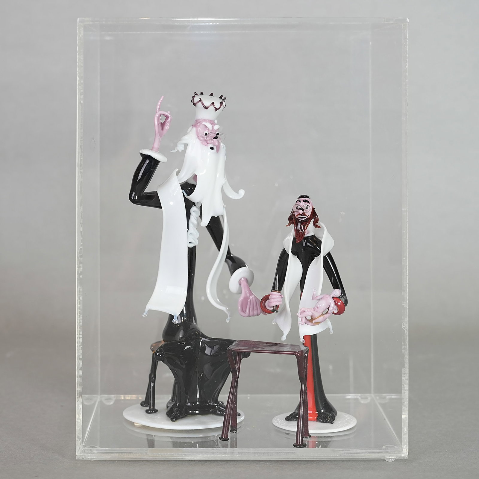 Gianni Toso (Italian B.1940 ), Murano Glass Birth Circumcision Figures: Gianni Toso (Italian b.1940 ), Murano glass birth circumcision figures, Judaica. 9.25"h x 6.89"w x 5.31"l (23.5 x 17.5 x 13.5 cm) Provenance: Sold Butterfield ( later become Bonhams Los Angeles) in 19