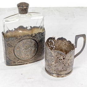 A Persian Isfahan niello silver mounted flask and tea glass holder