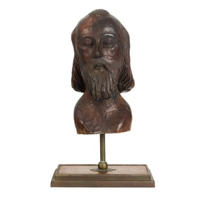 A Spanish Colonial carved wood head of a saint