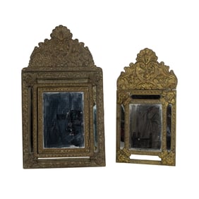 Two Dutch Baroque style brass repousse and beveled glass mirrors, early 20th century