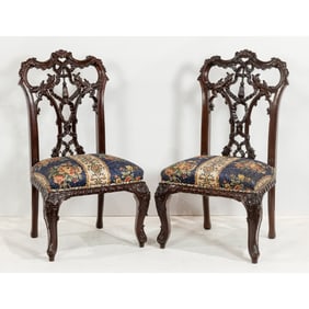 A Pair of highly carved mahogany Chippendale sidechairs second half 19th century