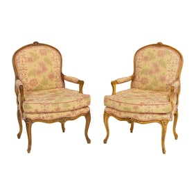 A pair of Louis XV style fauteuil armchairs