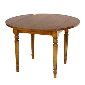 A French or Italian Provincial style pine table