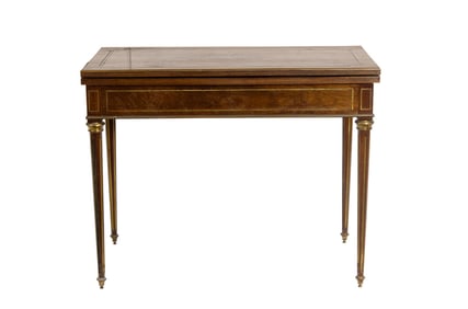 A Napoleon III brass inlaid walnut games table