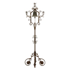 A Spanish Colonial bronze bell in wrought iron candle frame, 18th century