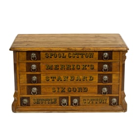 A Merrick's oak spool cabinet