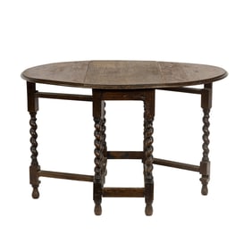A William and Mary style quarter sewn oak gateleg table