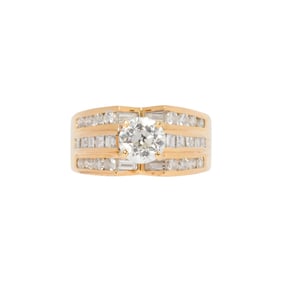 A diamond and 18k gold ring