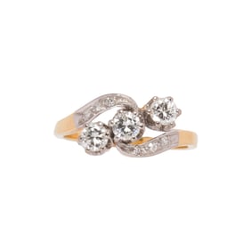 A diamond and 18k gold ring