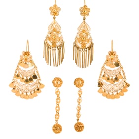 Three pairs of gold earrings