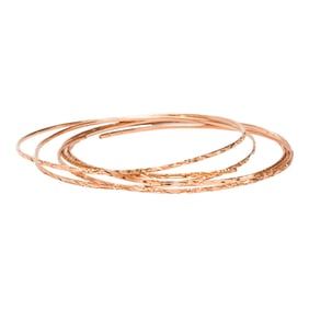 A group of 14k gold bangles
