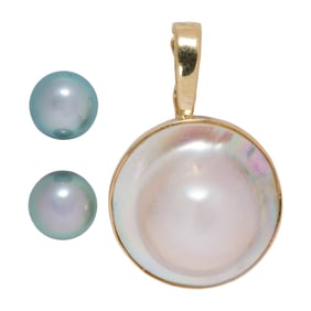A mabe cultured pearl and 14k gold pendant enhancer and pair of stud earrings
