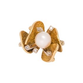 A cultured pearl, diamond and 18k bi-color gold ring