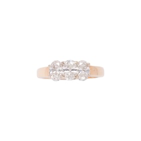 A diamond and 14k gold 3-stone ring