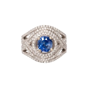 A sapphire, diamond and 14k white gold ring
