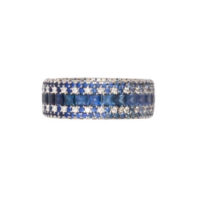 A sapphire, diamond and platinum ring