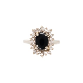 An onyx, diamond and 14k white gold ring