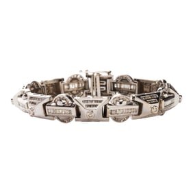 A diamond and 14k white gold bracelet