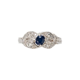 A sapphire, diamond and 14k white gold ring