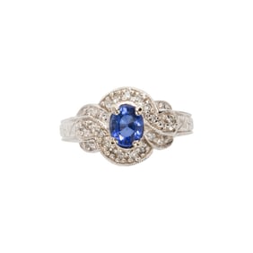 A sapphire, diamond and 14k white gold ring