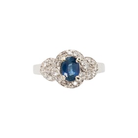 A sapphire, diamond and 14k white gold ring