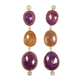 An pair of 18k gold sapphire and diamond earrings