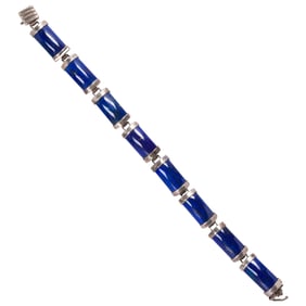 A sterling silver and lapis bracelet
