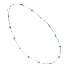 A turquoise and 18k gold station necklace