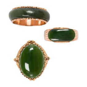 Three jade and 14k gold rings