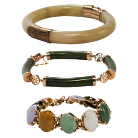 Three jade and 14k gold bracelets