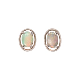 A pair of opal and 14k gold stud earrings