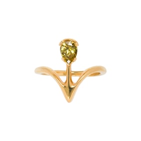 A colored diamond and 18k gold ring
