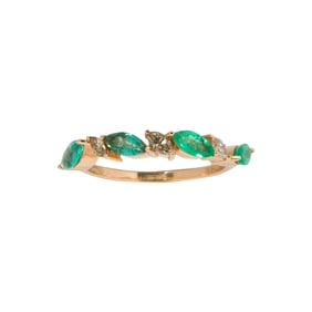 An emerald, diamond and 18k gold ring