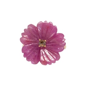 A sapphire, diamond and 18k gold ring