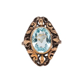 An antique blue topaz, 14k gold and silver ring