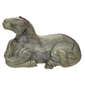 A Chinese mottled celadon jade horse