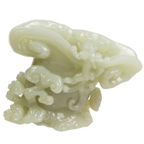A Chinese white jade libation cup
