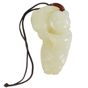 A Chinese white jade boy toggle