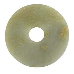 A Chinese celadon jade bi disc