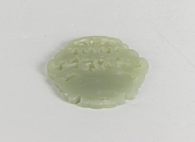 A Chinese celadon jade basket pendant