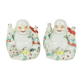 A pair of Chinese famille rose laughing Buddha with children
