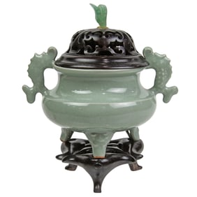 A Chinese Song style celadon glazed tripod censer
