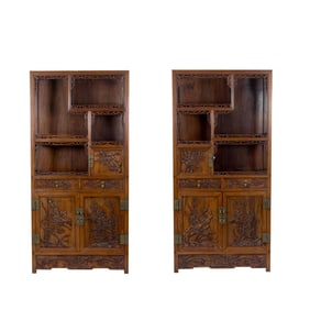 A pair of Chinese hardwood curio cabinets