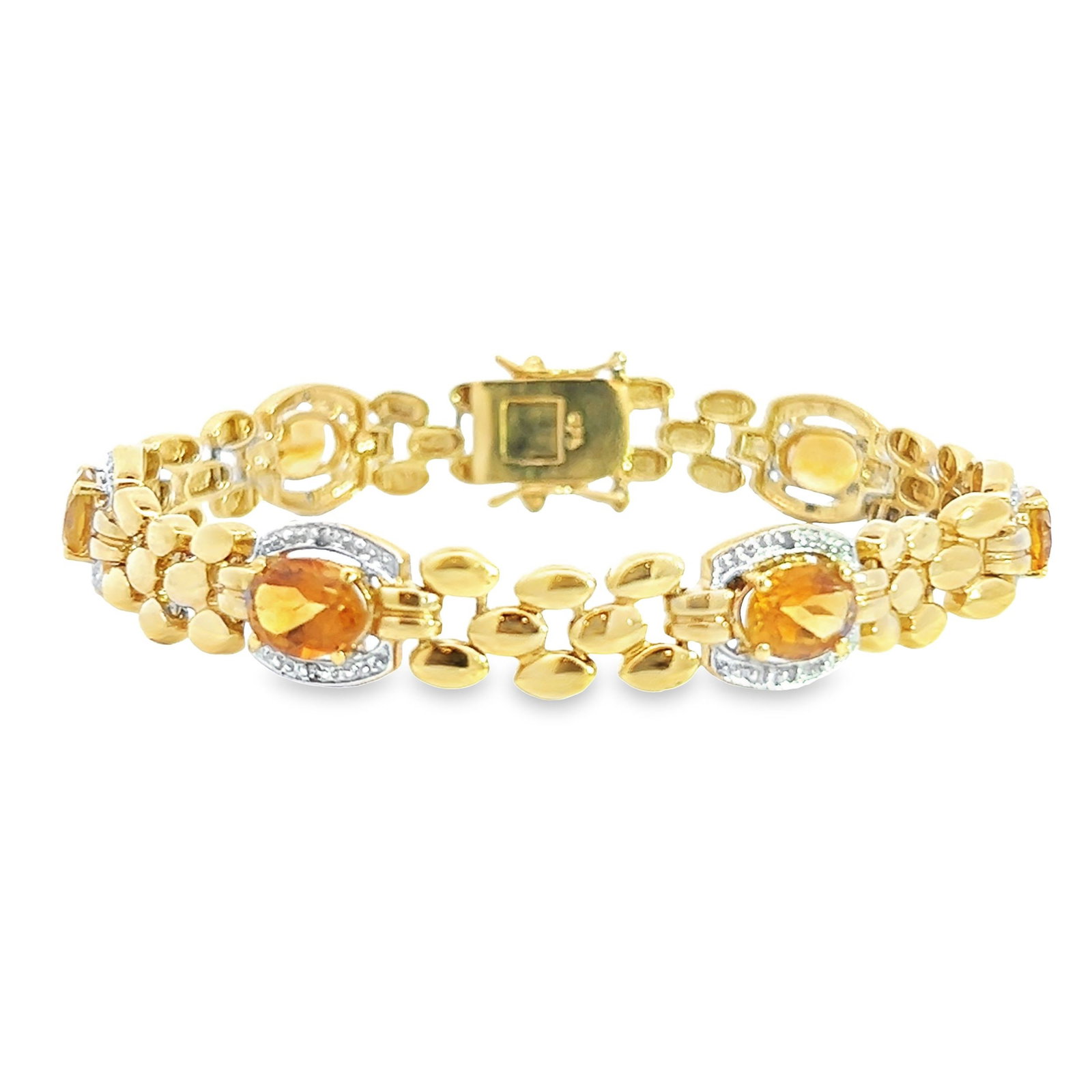 Citrine, Diamond and 18K Gold Bracelet: Citrine, diamond and 18k gold bracelet, adorned with citrine and diamonds, crafted in a graduated line of oval citrines. 7.87"l x 0.39"w (20 x 1 cm)