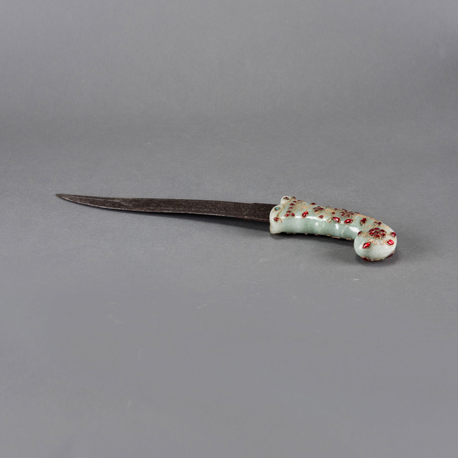 Jade Hilted Iron Sword: Jade-hilted iron sword, with a carved jade hilt and iron blade. 13.78"l (35 cm)