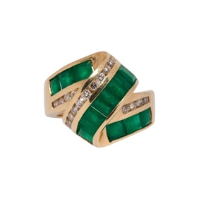 An emerald, diamond and 14k gold ring