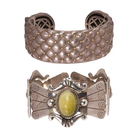 A group of two sterling silver bracelets