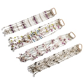 A group of assorted silver necklaces